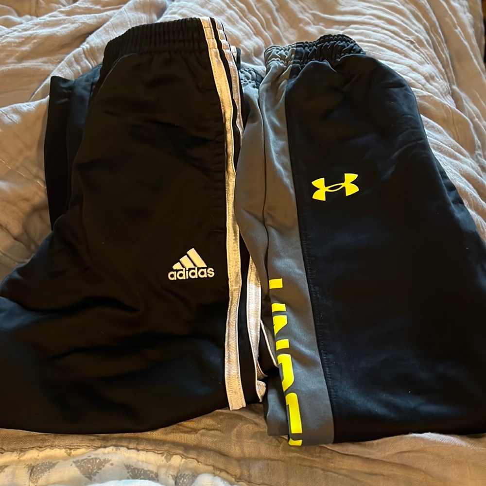 Boys (2) pairs of pants. One adidas one under armour. Size 7.